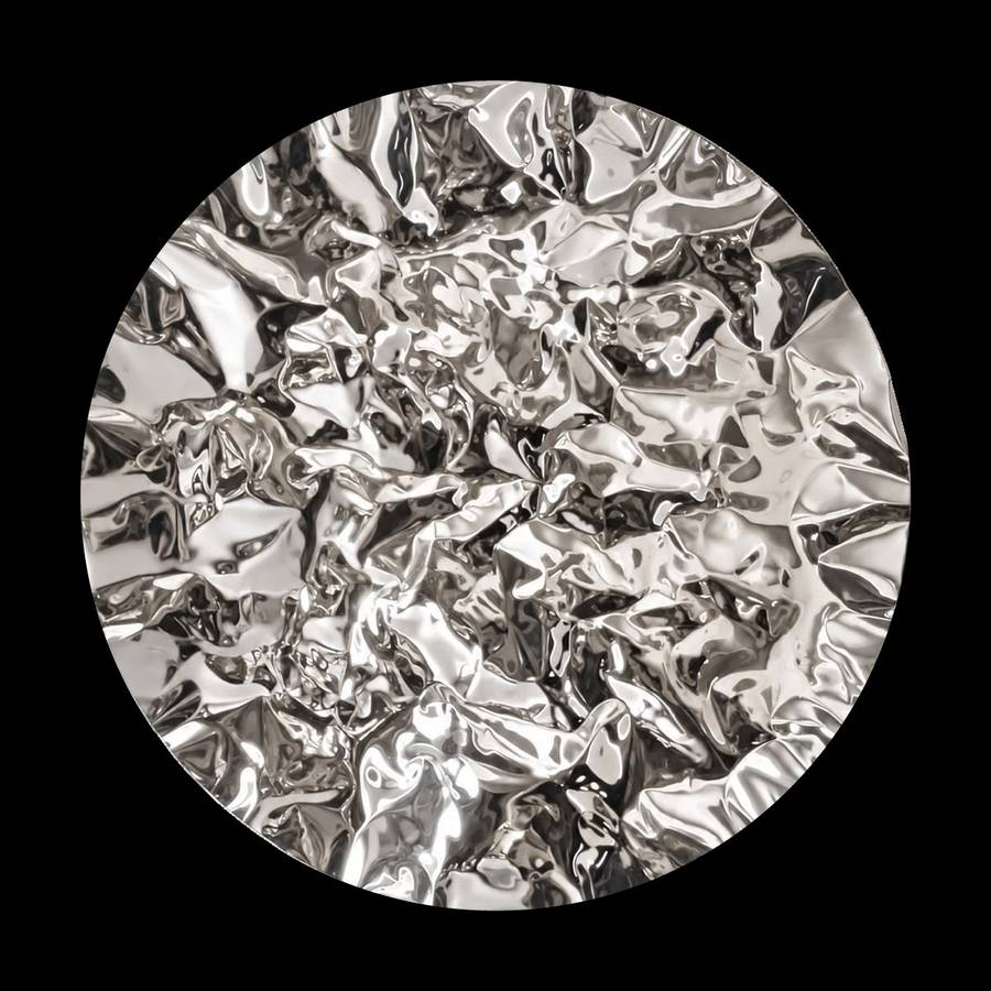 Argent by Hussain Jamil, a round silver crumpled stainless steel wall sculpture